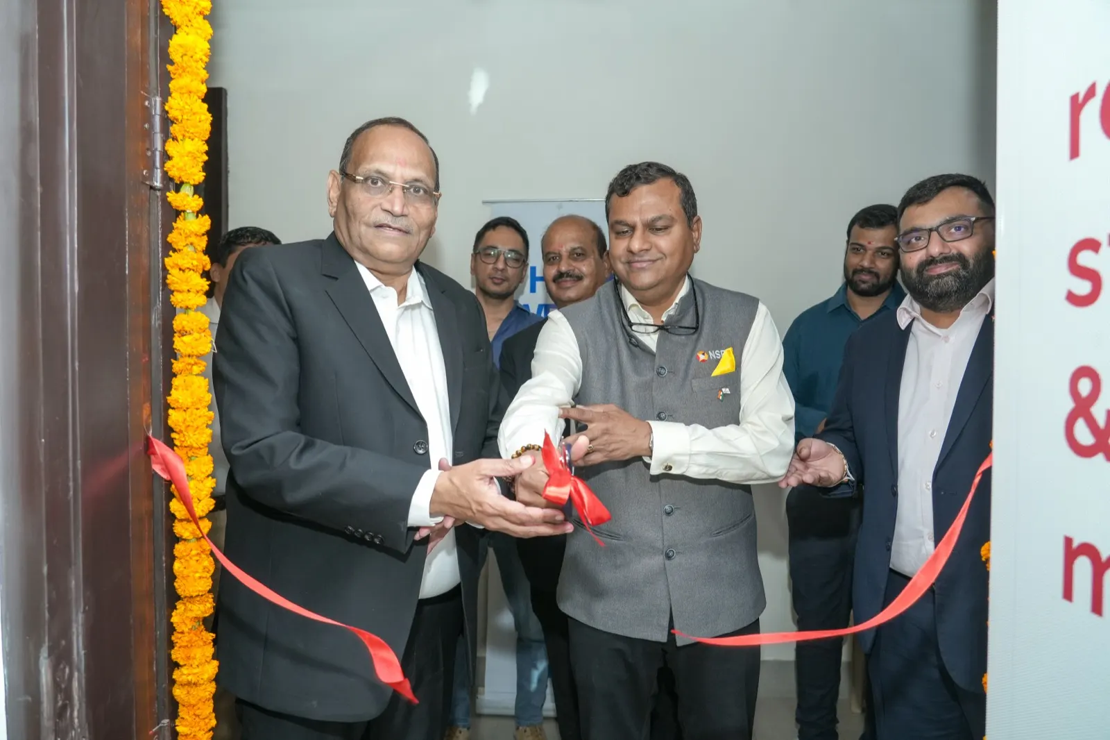 Ribbon-cutting at the IFSC office inauguration